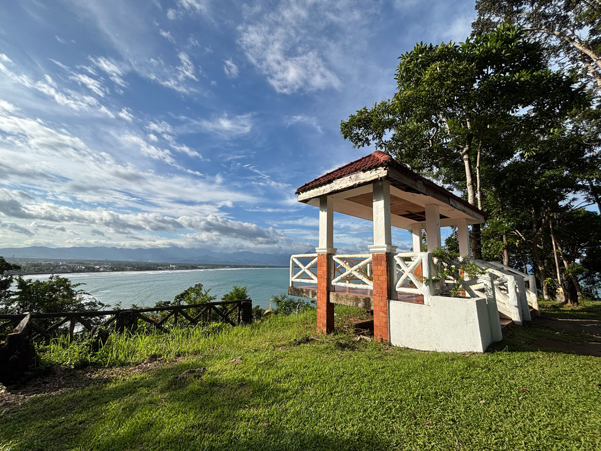 Gazebo overlooking the ocean and the town of Baler from Ermita Hill on a clear sunny day